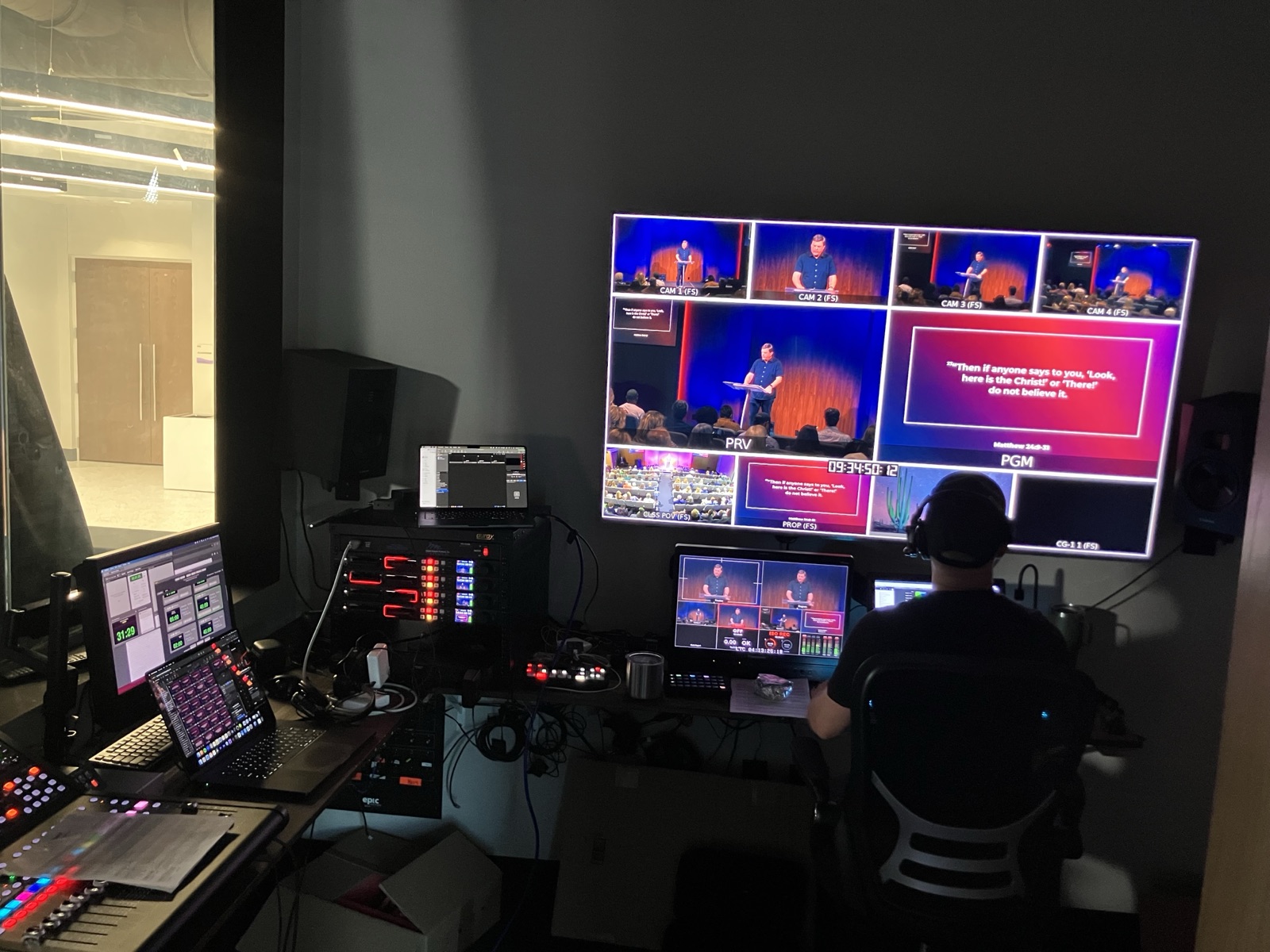Eric working at a multi-camera livestream production console